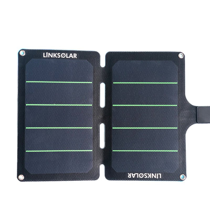 11W foldable charger unfolded flat; dual panels with alignment slots and corner eyelets.