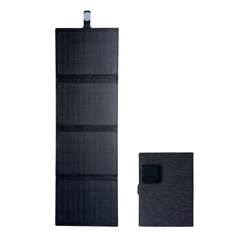 Four-section 28W solar panel fully unfolded beside its folded back with rear output module