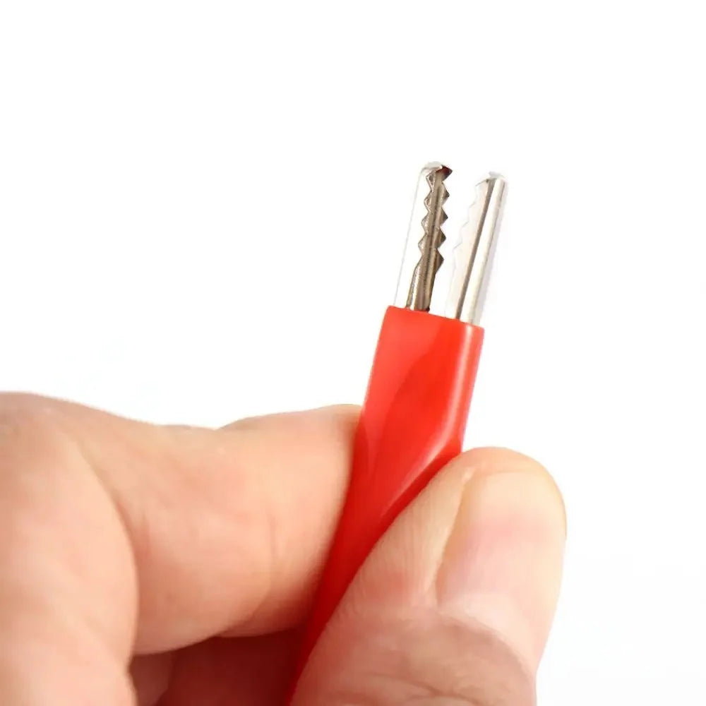 3.5W solar panel — red clip held for scale