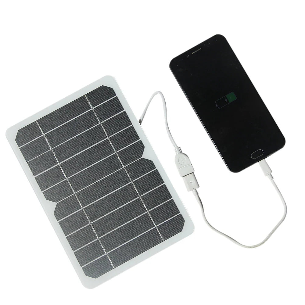 5W 5W USB solar panel — USB panel phone-charging demonstration