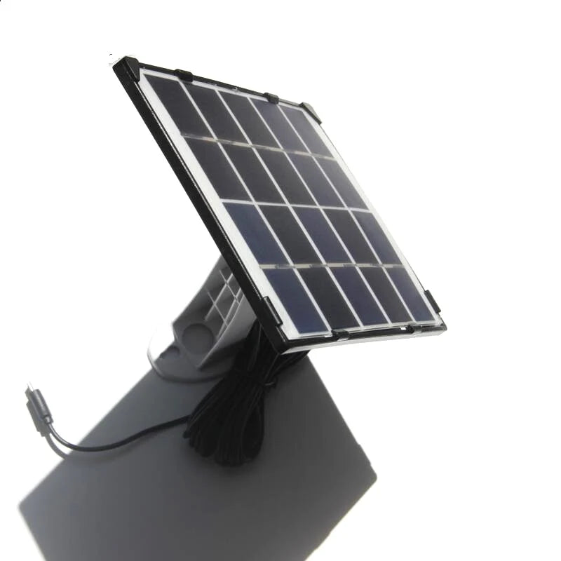 Security camera solar panel on an adjustable mounting bracket
