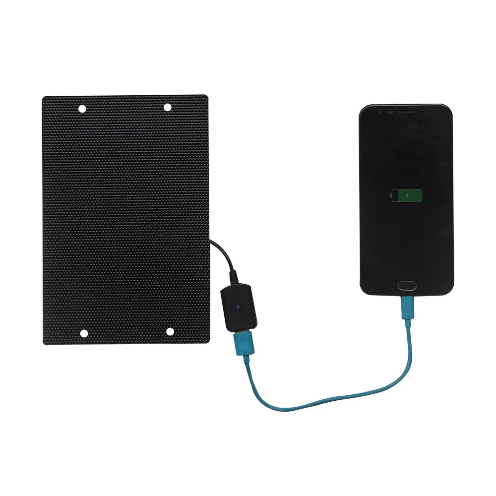 ETFE solar panel connected to a phone by USB cable