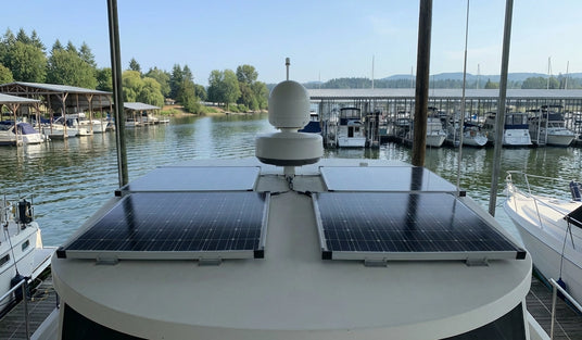 solar panel system installed on boat roof at lakeside pier