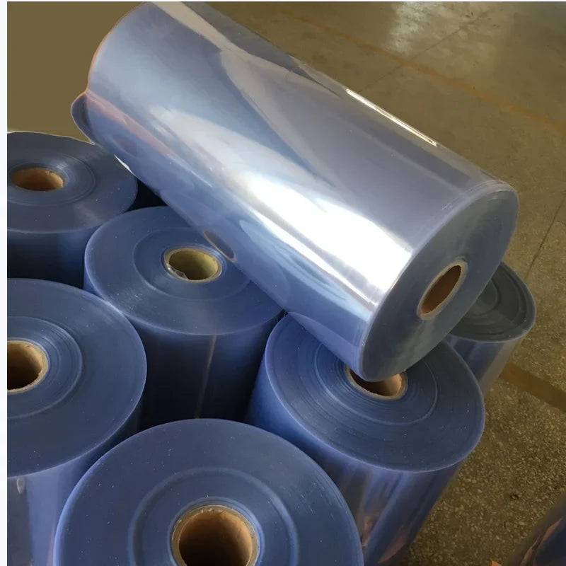 PET backsheet film roll displayed over stacked rolls