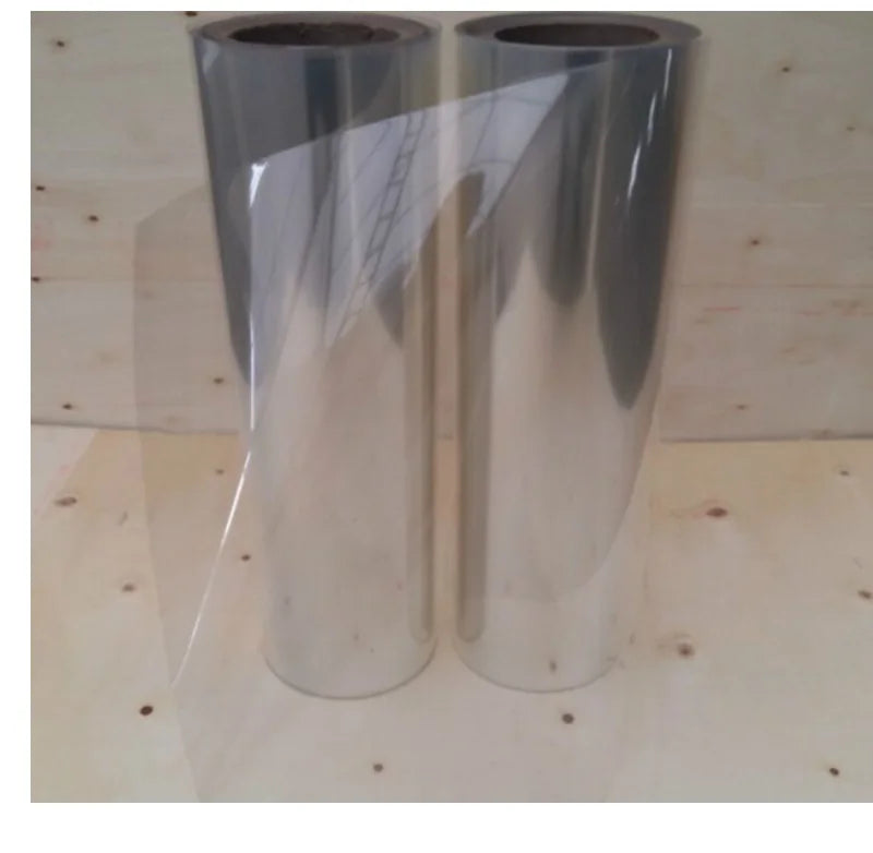 Two upright rolls of PET solar panel backsheet film