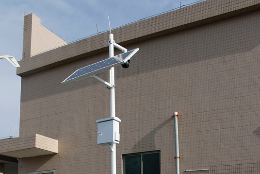 solar panel pole mount powering outdoor surveillance camera system