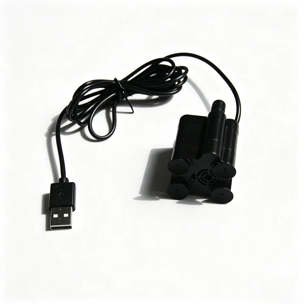 Compact USB water pump with suction feet