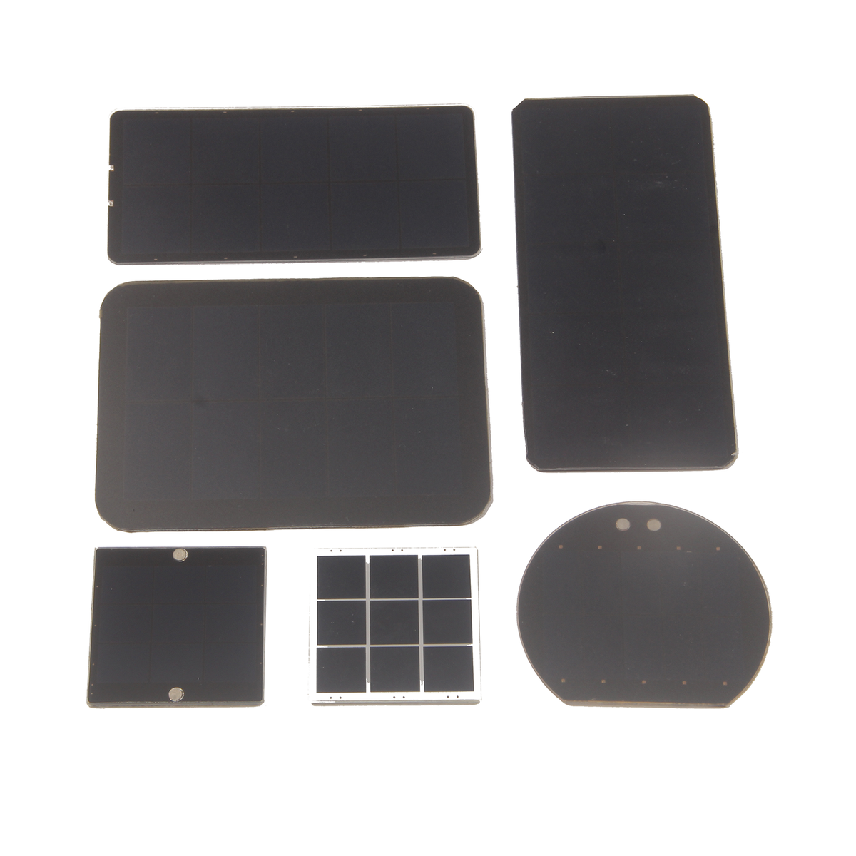 Assorted mini solar panels in various custom shapes on white background