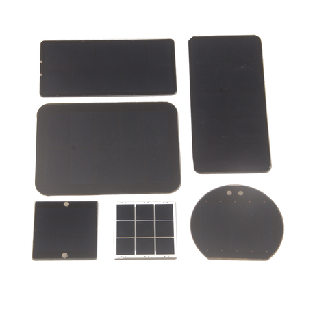 Assorted mini solar panels in various custom shapes on white background