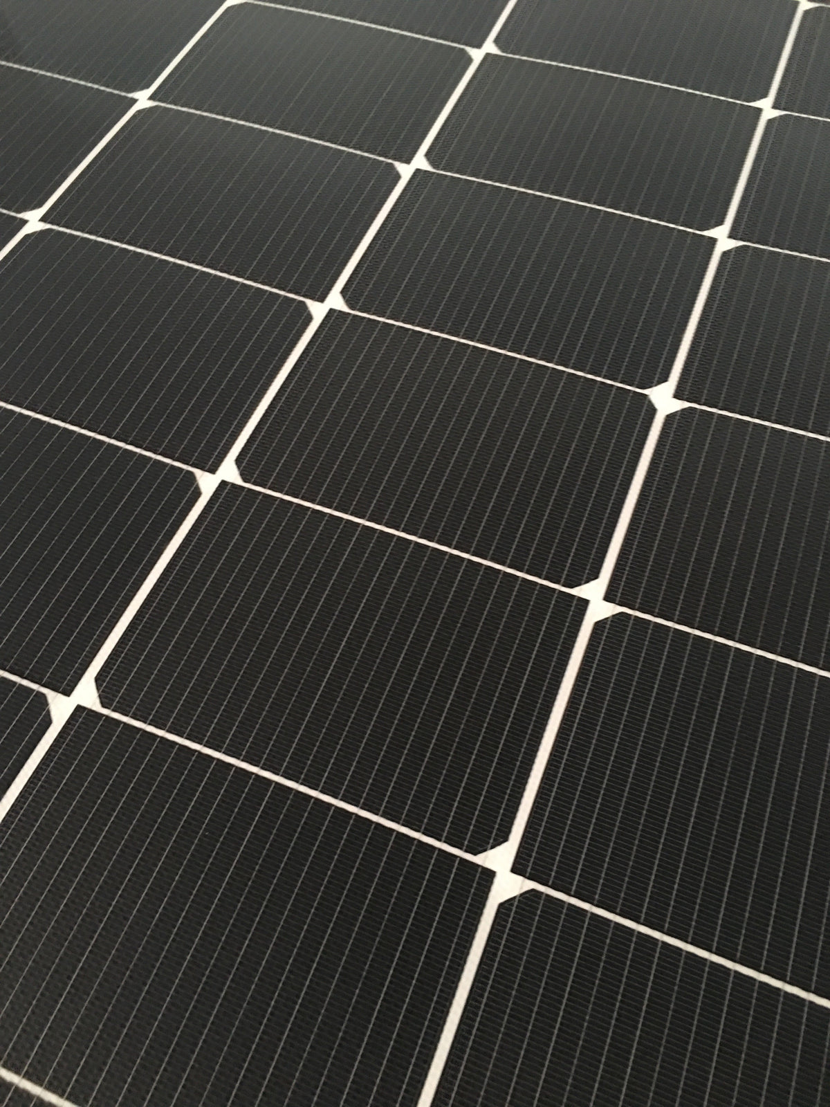 Close up view of monocrystalline solar cell panel grid