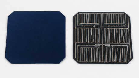 Close-up of SunPower IBC solar cell showing uniform front surface with no gridlines and rear contact pattern on clean white background