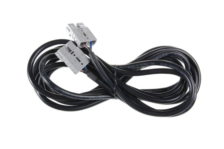 User-supplied photograph: coiled black cable assembly with two gray connector housings