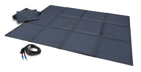 Unfolded solar blanket beside a carry pouch and a separate coiled cable