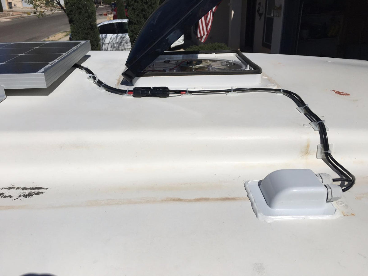 Solar panel wiring and cable entry gland on an RV roof