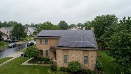 solar panels working on a cloudy day on a residential rooftop