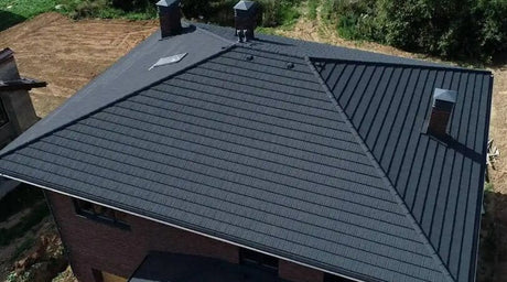 Installation example of charcoal grey solar roof tiles on a residential house roof