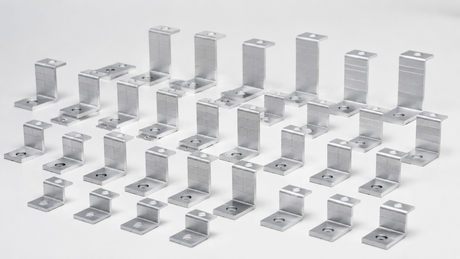 Neatly arranged compact aluminum Z-shaped solar panel mounting brackets in multiple sizes