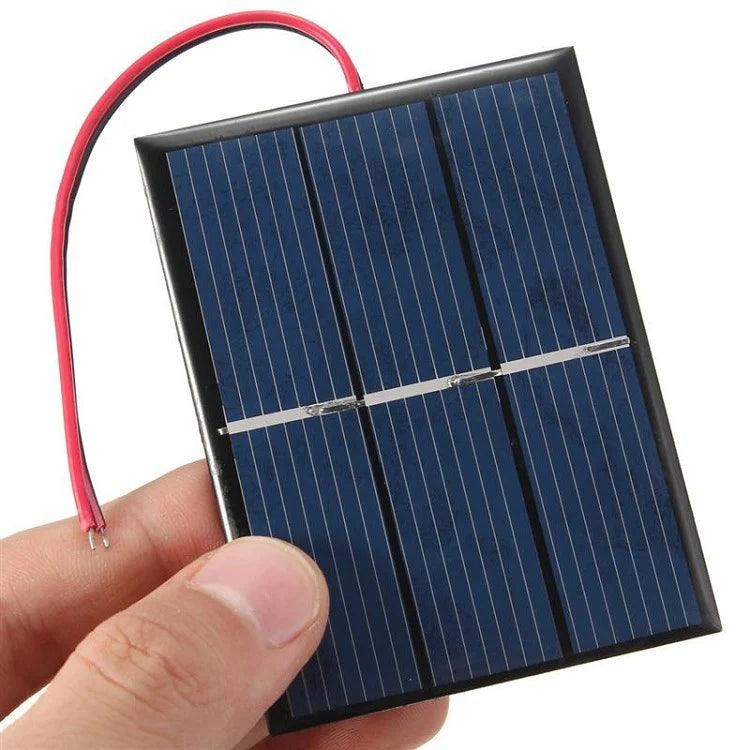 0.65W 0.65W mini solar panel — wired panel held for scale