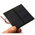 0.7W mini solar panel — wired mini panel held for size