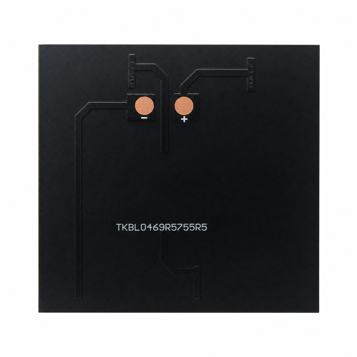 Rear of 0.9W mini solar panel with polarity-marked copper solder pads