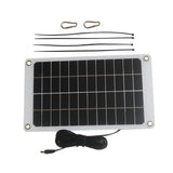 Solar panel with two carabiners and four cable ties