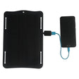 10W solar panel — panel charging a phone