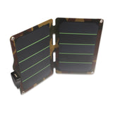 Camouflage charger partially opened at an angle showing panel texture and hinge.