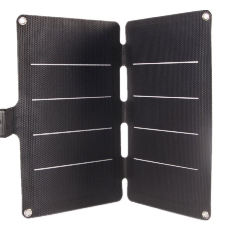 Foldable solar charger standing open in a tent-style position, matte surface.