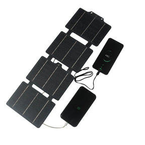 14W foldable solar charger — four-section charger powering devices