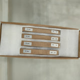 One-eighth-cut 166 mm solar cell strips 5/8 to 8/8 in their own foam slots inside the shipping carton