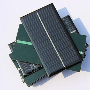1W 1W mini solar panel — small rectangular panels front and rear