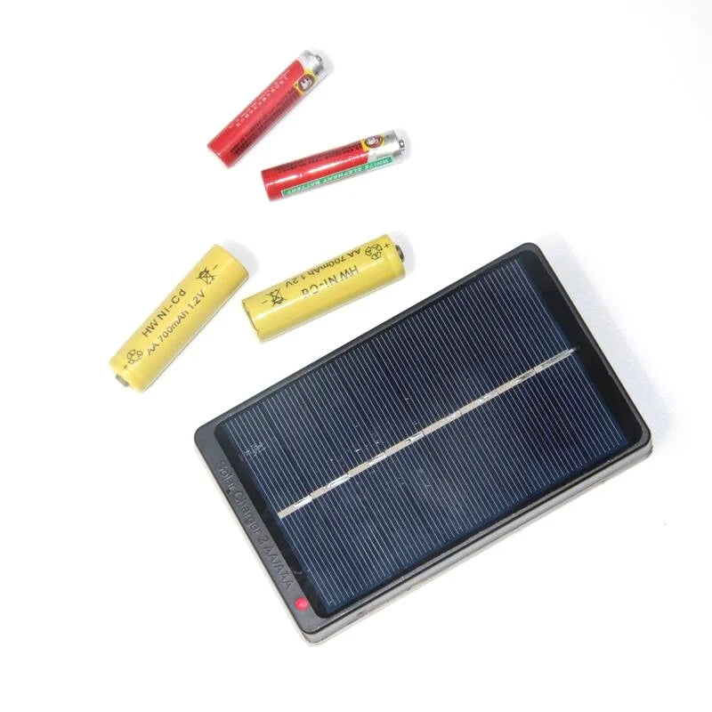 1W solar AA charger — AA and AAA cell size examples