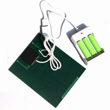 2W solar AA AAA battery charger — panel rear and three-cell charger