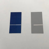 Front and back views of a 52mm x 26mm polycrystalline solar cell
