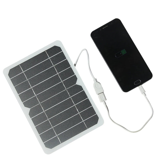 5W 5W USB solar panel — USB panel phone-charging demonstration