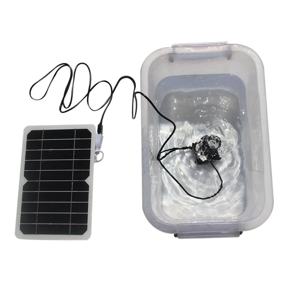 5W solar fountain pump — fountain operating in water container