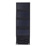 7W foldable solar charger — four-fold panel and dual USB outputs