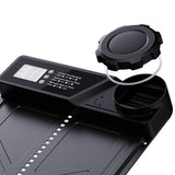 Coop door controller close-up with circular cap, seal ring and display