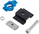 Black solar panel mid clamp with bolt, channel nut, washer, and retainer