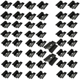 Bulk quantity of black solar panel mid clamps on a white background