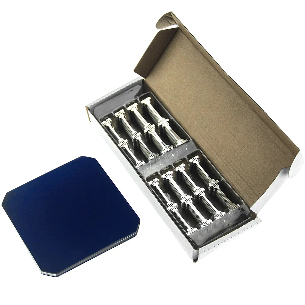 C60 solar cell beside a boxed dog bone tabbing wire set