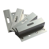 Four 100 mm aluminum Z-brackets stacked, showing slot and hole pattern.