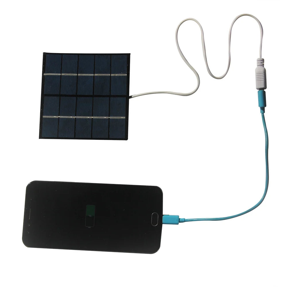 1.2W 5V Epoxy Mini Solar Panel with 35cm USB-A Lead — front panel charging demonstration