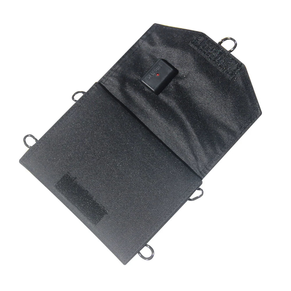 Black fabric rear of partly folded solar charger