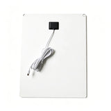 White rear of the panel with connection box and lead