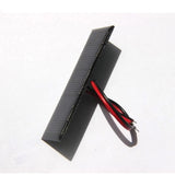 Epoxy module at an angle with attached wires