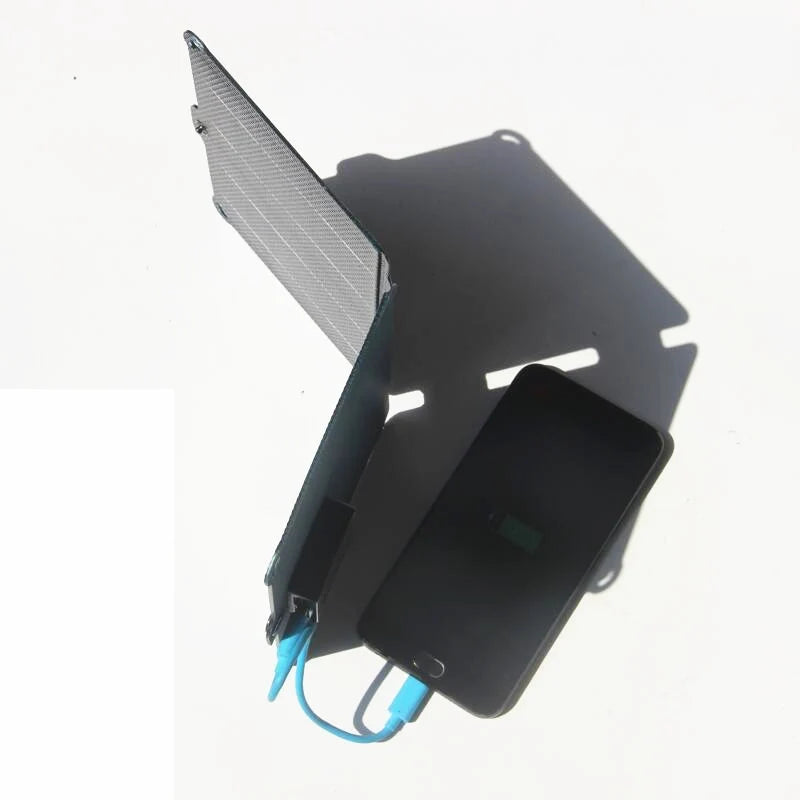 Panel stood at an angle with a phone charging example