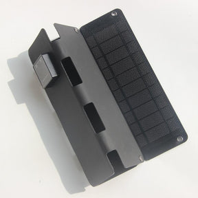 Black four-fold panel partly closed