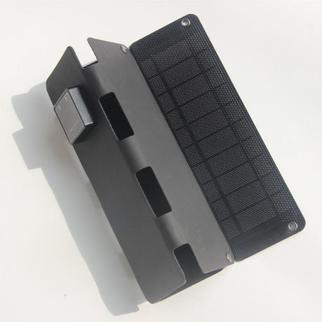 Black four-fold panel partly closed