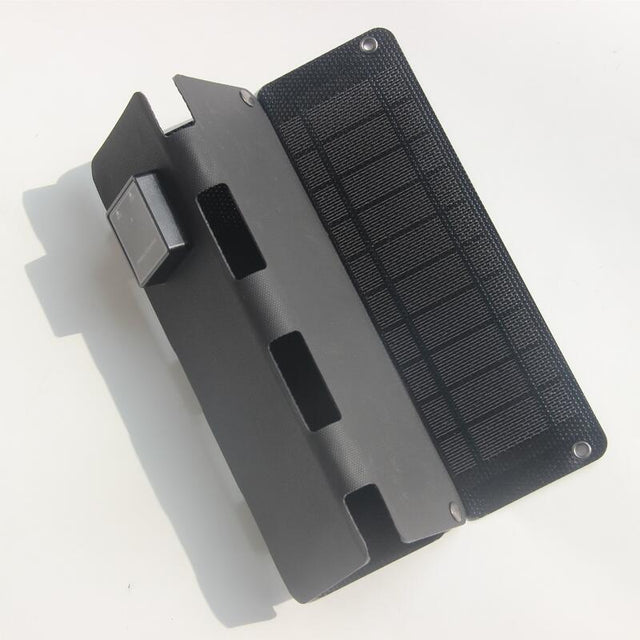 Black four-fold panel partly closed
